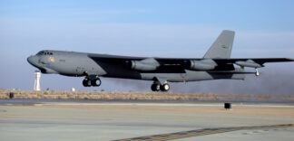 EDWARDS AIR FORCE BASE, Calif. -- A B-52 Stratofortress takes off from Edwards Air Force Base, Calif., on a flight test of its new avionics system.  The new system is part of the B-52 Avionics Midlife Improvement program.  Flight tests began in December and will run through March 2004.  The upgrade is the greatest improvement made to the bomber in the last 15 years.  (Photo by David Siu)